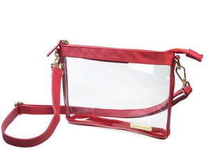 CAPRI DESIGNS CLEAR SMALL CROSSBODY BAG WITH RED AND GOLD ACCENTS